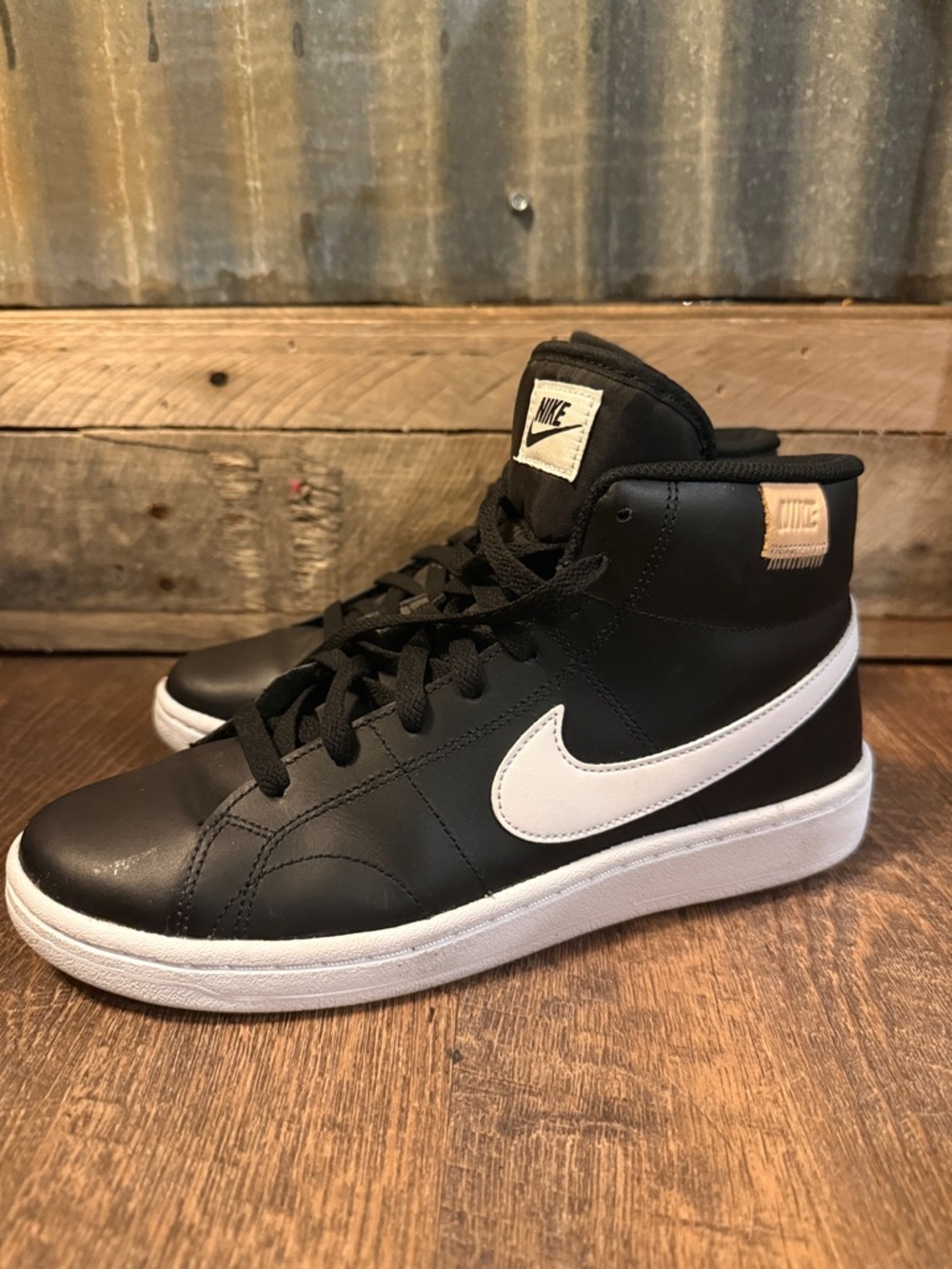 Women’s Nike Black and White High-Top Sneakers
